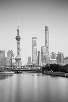 Images Dated 6th November 2016: Pudong skyline across the Suzhou Creek and Waibaidu bridge, Shanghai, China