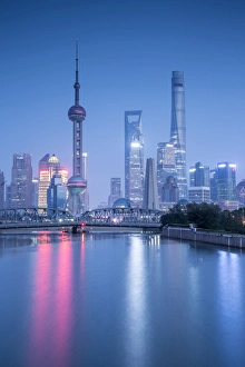 Architecture Collection: Pudong skyline across the Suzhou Creek and Waibaidu bridge, Shanghai, China