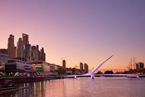 The Puente de la Mujer bridge and the Puerto Madero's skyscrapers at sunrise, Buenos Aires, Argentina