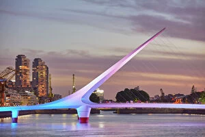 Images Dated 27th April 2023: The 'Puente de la Mujer' bridge with a special illumination at twilight, Puerto Madero, Buenos Aires