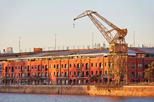Images Dated 27th April 2023: A Puerto Madero's yellow crane at sunrise, Buenos Aires, Argentina