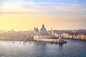 Punta della Dogana during sunset as seen from St George island. Venice, Veneto, Italy