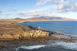 Las Palmas Prints: Punta Jandia lighthouse (Faro de la Lola) on cliffs above the ocean, Fuerteventura