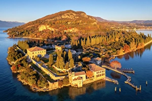 Garda Lake Prints: Punta San Vigilio at sunset in autumn. Garda, Verona district, Italy