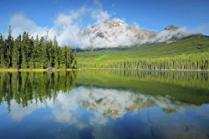 Images Dated 3rd May 2023: Pyramid Mountain reflected in Pyramid Lake, Jasper National Park, Alberta, Canada