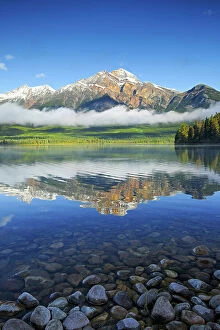 Images Dated 3rd May 2023: Pyramid Mountain reflected in Pyramid Lake and the Canadian Rocky Mountains, Jasper National Park