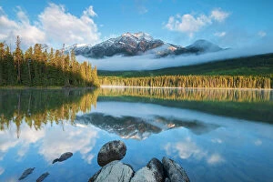 Q2 2023 Collection: Pyramid Mountain reflected in Pyramid Lake in morning fog, Jasper National Park, Alberta, Canada