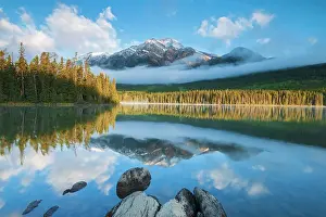 Rocky Mountains Prints: Pyramid Mountain reflected in Pyramid Lake in morning fog