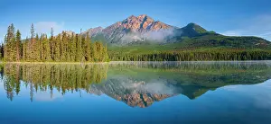 Pyramid Lake Prints: Pyramid Mountain reflected in Pyramid Lake with morning fog Jasper National Park