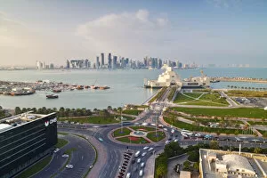 Images Dated 9th June 2011: Qatar, Doha, Elevated view over the Museum of Islamic Art and the Dhow harbour to