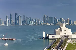 Images Dated 9th June 2011: Qatar, Doha, Elevated view over the Museum of Islamic Art and the Dhow harbour to