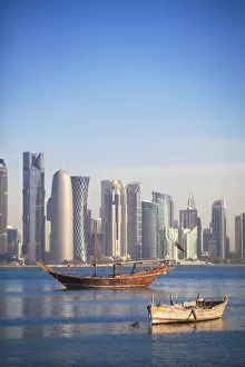 Dhow Prints: Qatar, Doha, looking across Doha Bay to skyscrapers of West Bay
