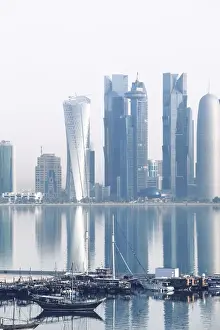 Dhow Prints: Qatar, Doha, looking across Doha Bay to skyscrapers of West Bay
