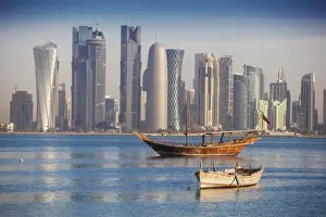Dhow Prints: Qatar, Doha, looking across Doha Bay to skyscrapers of West Bay