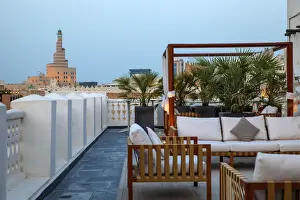 Qatari Prints: Qatar, Doha, Rooftop terrace of boutiqe hotel at Souq Waqif with Fanar Qatar Islamic
