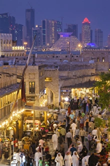 Qatar, Doha, Souq Waqif, redeveloped bazaar area, elevated view with West Bay skyscrapers