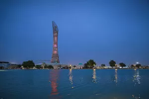 Images Dated 17th June 2013: Qatar, Doha, The Torch Hotel reflecting in the lake in Aspire Park