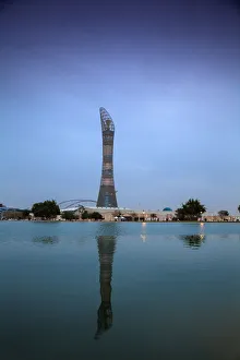 Images Dated 17th October 2013: Qatar, Doha, The Torch Hotel reflecting in the lake in Aspire Park