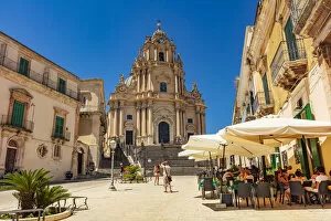 Images Dated 17th September 2020: Ragusa Ibla, Sicily. Tourists walking and sitting in the restaurants in the main square