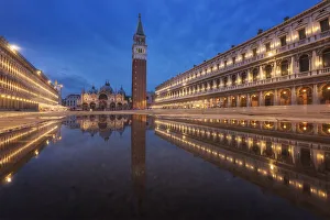 rain puddle reflectio at St. Mark Square, Venice, Italy