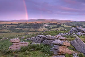 Rainbow Prints: Rainbow over Dartmoor at dawn, Holwell Tor, Dartmoor, Devon, England. Summer (August)
