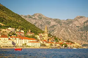 Red boat in front of Perast, Kotor Bay, Montenegro