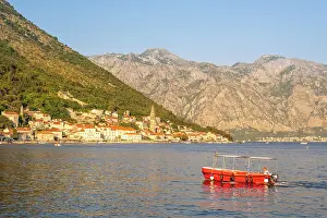 Perast Prints: Red boat in front of Perast, Kotor Bay, Montenegro