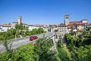 Images Dated 14th August 2019: red car passes over the Devils bridge (Ponte del Diavolo) on the Natisone river