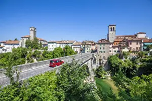 Udine Prints: red car passes over the Devils bridge (Ponte del Diavolo) on the Natisone river