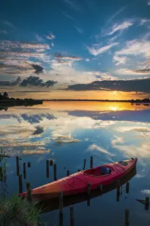Red Kayak on Hersey Mere at Sunset, Norfolk Broads National Park, Norfolk, England