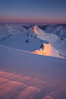 Ski Touring Prints: Red light of sunrise from the summit of San Matteo Peak