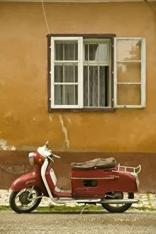 Red moped, Sighisoara, Transylvania, Romania