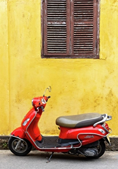 Hoi An Prints: Red moped against yellow wall, Hoi An, Vietnam