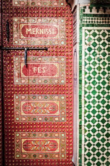 African Culture Collection: Red painted old wooden doorway, Fez, Morocco