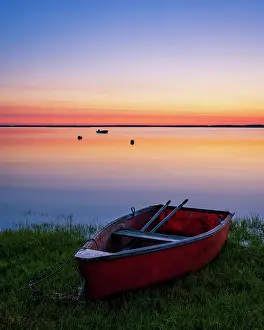 Estuary Prints: Red rowboat at sunrise on Cape Cod marsh, Orleans, Massachusetts, USA