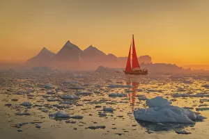 Michael Blanchette Prints: Red sailboat at twilight in Disko Bay, Greenland