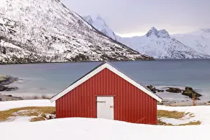 Timber Prints: Red timber rorbu (cabin) with Mefjorden in the background, Mefjordbotn, Senja, Norway
