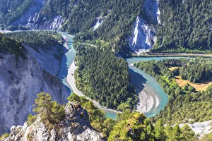 Red train travel in the Rhine Gorge(Ruinaulta), Flims, District of Imboden, Canton