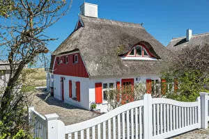 Ahrenshoop Gallery: Red and white thatched dyke house in Ahrenshoop, Mecklenburg-West Pomerania, Northern Germany