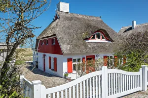 Ahrenshoop Gallery: Red and white thatched dyke house in Ahrenshoop, Mecklenburg-West Pomerania, Northern Germany