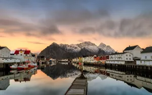Henningsvaer Prints: Reflected in the waters, Henningsvaer fjord. Lofoten Islands. Norway. Europe