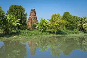Reflection of ancient temple near Bagaya monastery, Inwa (Ava), Mandalay Region, Myanmar Reflection of ancient temple near Bagaya monastery, Inwa (Ava), Mandalay Region, Myanmar