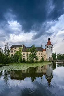 Reflection of Blatna Castle in pond, Blatna, Strakonice District, South Bohemian Region, Czech Republic