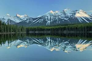 Images Dated 20th April 2023: Reflection of Herbert Lake and the Bow Mountain Range, Banff National Park, Alberta, Canada