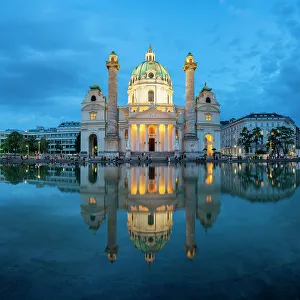Images Dated 13th September 2022: Reflection of illuminated Karlskirche at Karlsplatz at twilight, Innere Stadt, Vienna, Austria