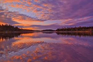 Storm Clouds Collection: Reflection in Middle Lake at sunrise Kenora, Ontario, Canada