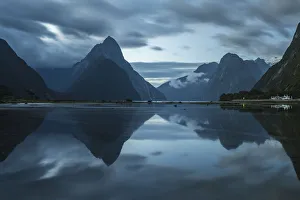 Reflection of Milford Sound at dusk in summer