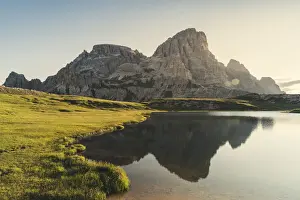 Reflection of Schusterplatte and Innichriedlknoten on the surface of Piani Lakes