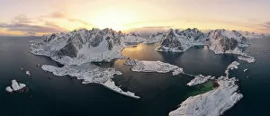 Images Dated 31st October 2022: Reine Bay, Sakrisoy and Hamnoy village with Olstind peak covered with snow, Lofoten Islands, Norway