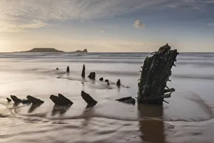 Gower Prints: Remains of the shipwreck Helvetia on Rhossili Beach, with Worm